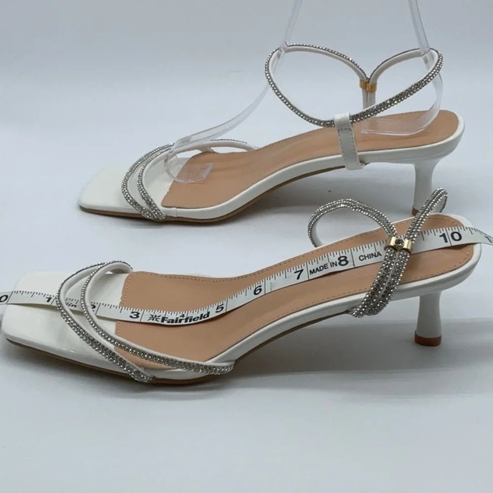 White jewel crusted short heels